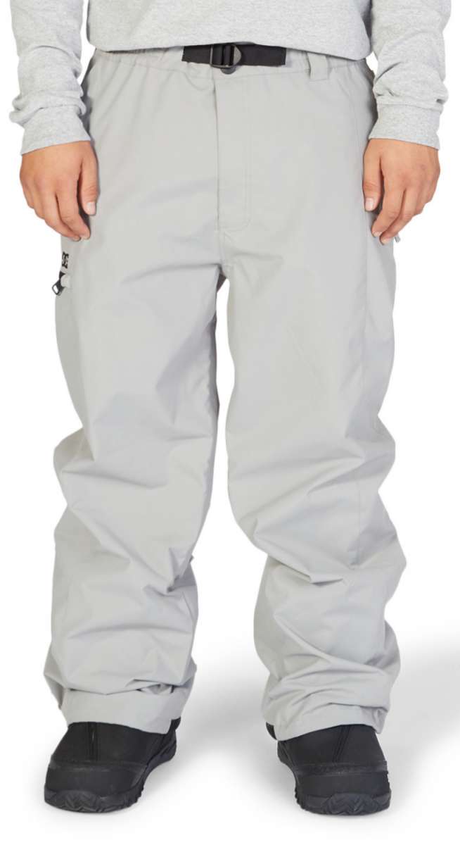 DC Primo Shell Pant 2023 - Black snow pants with a zippered pocket on the left thigh and adjustable Velcro straps at the waist.
