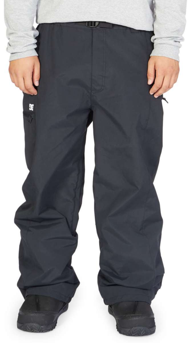 DC Primo Shell Pant 2023 - Black pants with a white logo on the left thigh.