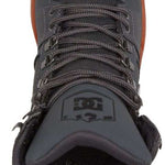 DC Pure High Top Winter Shoes 2022 - A pair of high-top shoes with a thick sole and laces, featuring a black upper material.