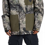 DC Servo Insulated Jacket - A black, white, and grey camouflage patterned jacket with a hood.
