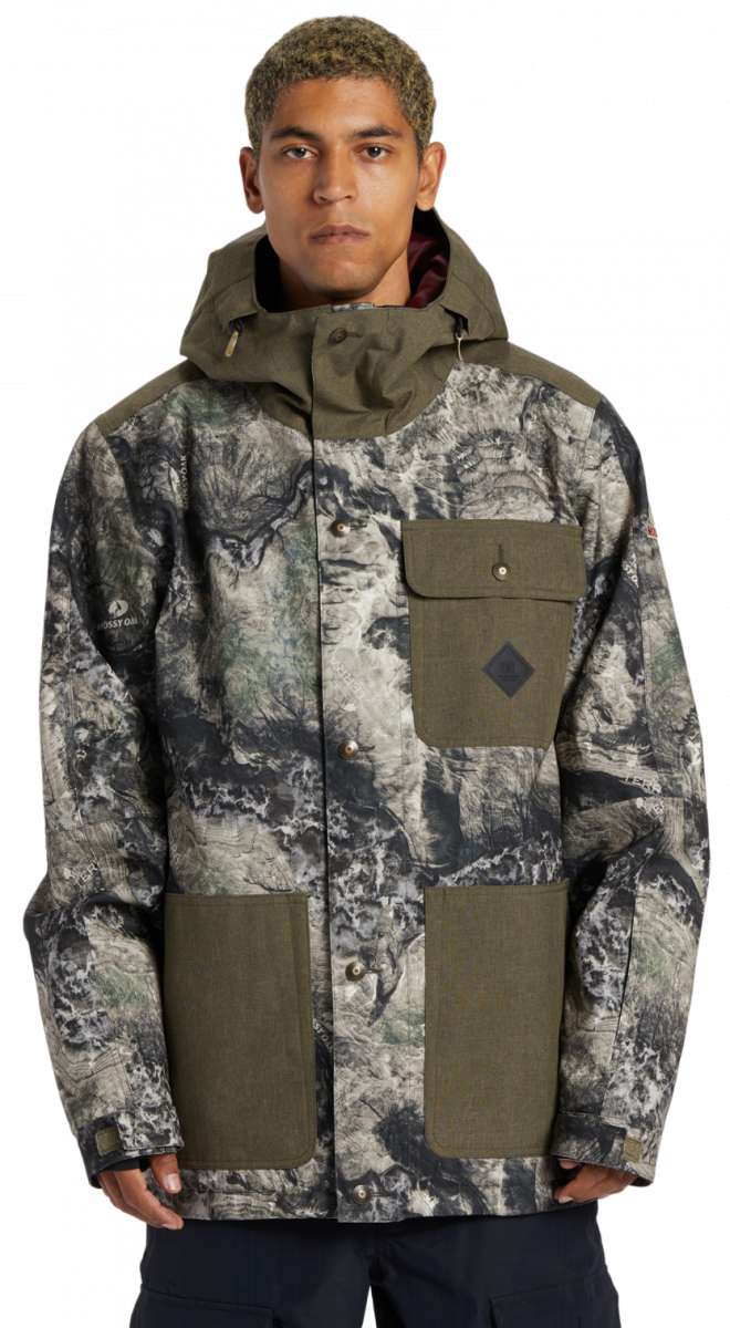 DC Servo Insulated Jacket 2024 - A black, grey, and white camouflage patterned jacket with a hood.