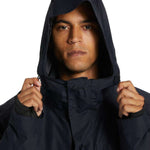 DC Servo Insulated Jacket - A black insulated jacket with a hood, featuring a zippered front and two pockets on either side.