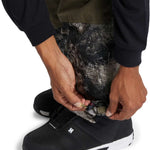 DC Shadow Shell Bib Pants 2024 - Black snow pants with a subtle white pattern on the side of the leg.