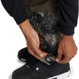 DC Shadow Shell Bib Pants 2024 - Black snow pants with a subtle white pattern on the side of the leg.
