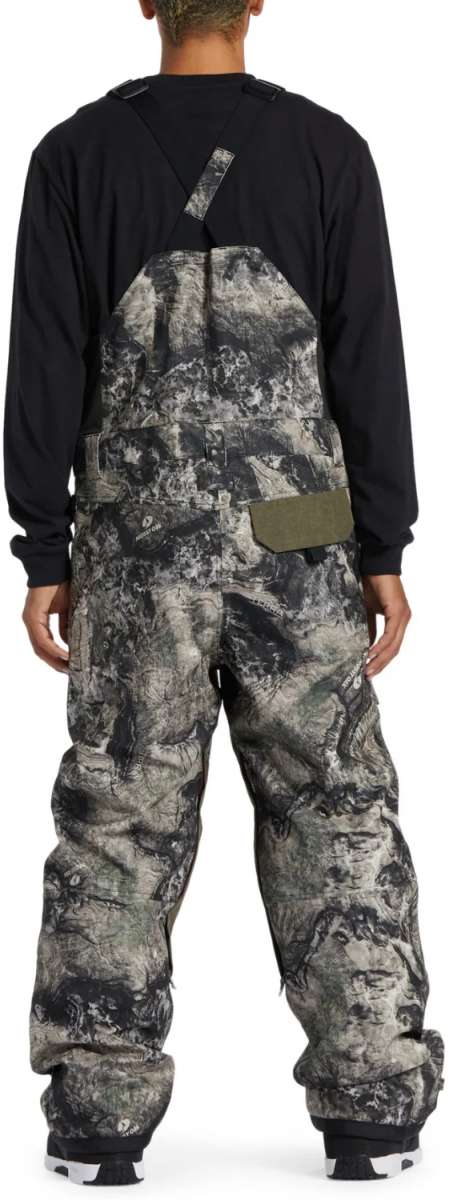 DC Shadow Shell Bib Pants 2024 - Black bib pants with a subtle white pattern and black hardware.