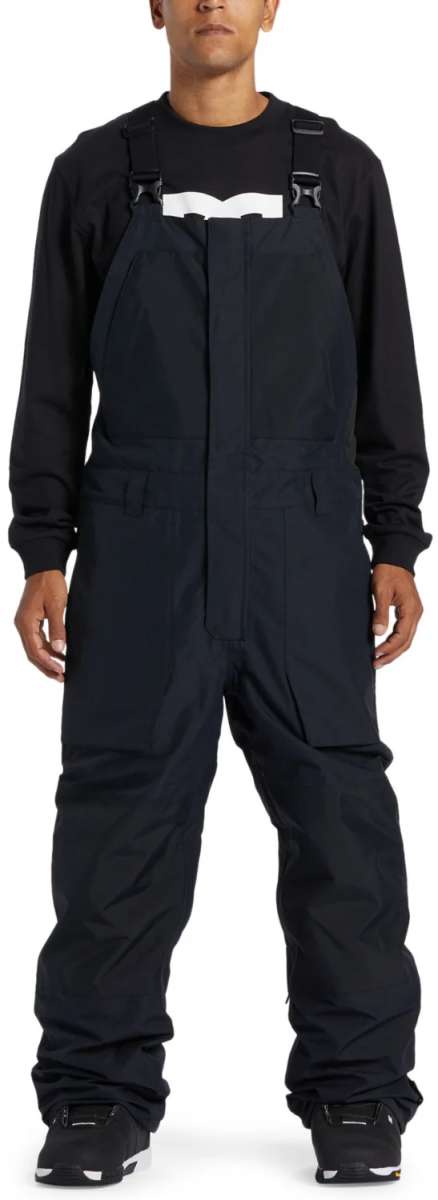 DC Shadow Shell Bib Pants 2024 - Black bib pants with white logo on left thigh and black buckle straps.