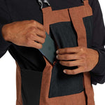 DC Shadow Shell Bib Pants 2024 - Black bib pants with a subtle white pattern and black hardware.