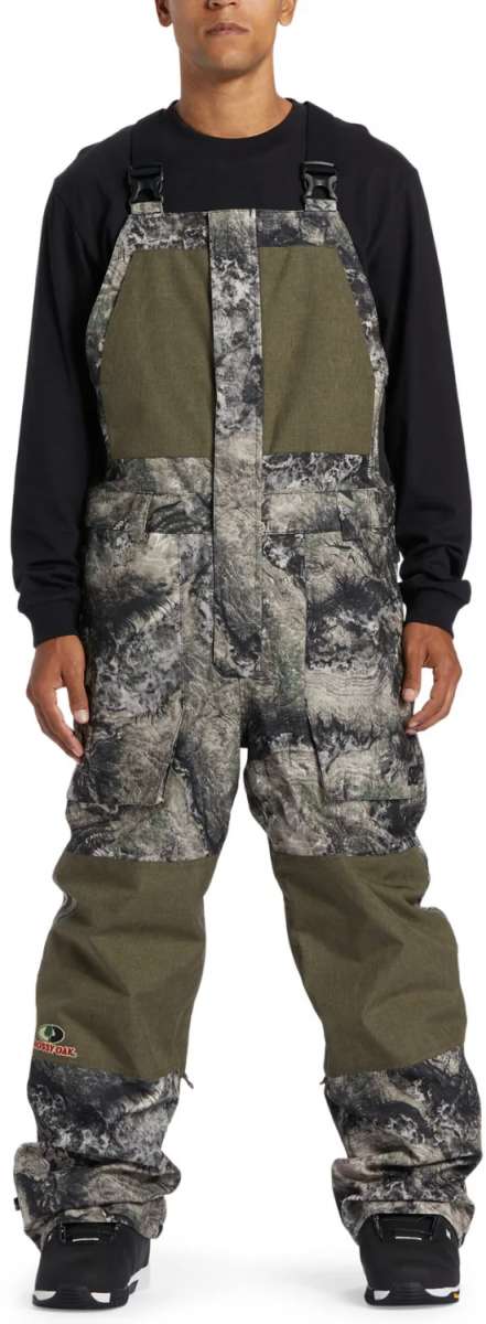 DC Shadow Shell Bib Pants 2024 - Black bib pants with a subtle white pattern and black hardware.