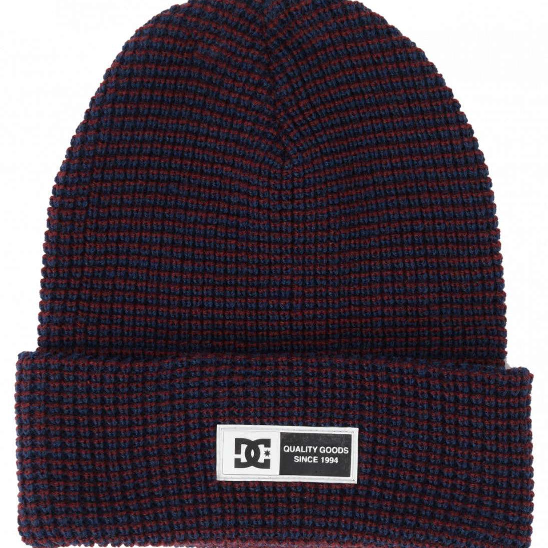 DC Sight Beanie 2024 - A navy blue beanie with a subtle red stripe pattern.