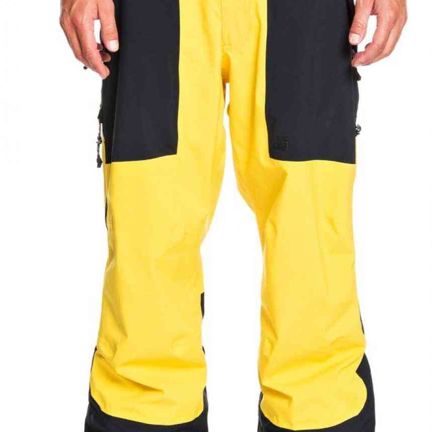 DC Squadron Shell Pants - Black pants with a yellow stripe down the side, zippered pockets and adjustable cuffs.
