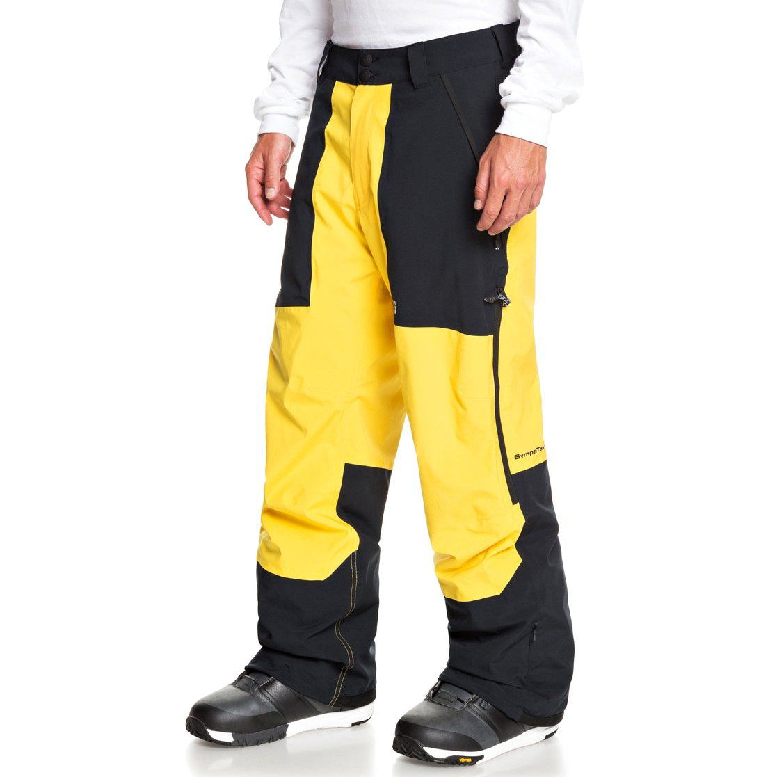 DC Squadron Shell Pants 2021 - Black pants with yellow accents on side pockets, belt loops and zipper fly.