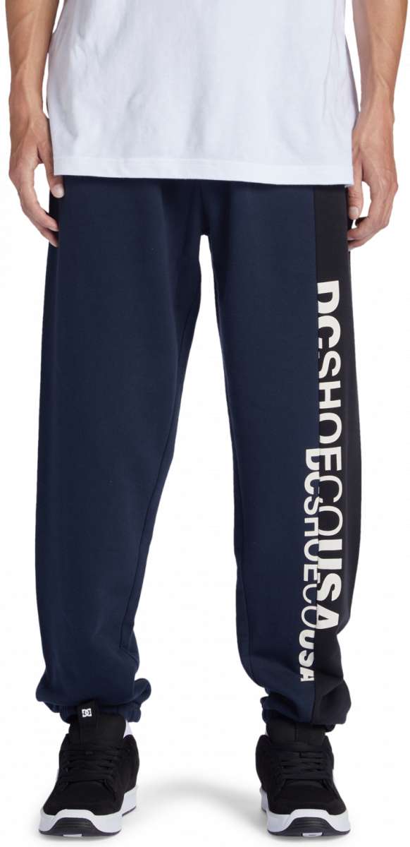 DC Static Sweatpants - Pair of navy blue sweatpants with white DC logo on left leg.