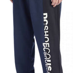 DC Static Sweatpants - Pair of navy blue sweatpants with white DC logo on left leg.