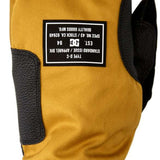 DC Tribute Mitt 2023 - Mitts are mustard yellow with black accents on the wrist strap and thumb.
