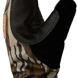 DC Tribute Mitt 2023 - A camouflage mitt with a textured palm and thumb, featuring a brown and green pattern.