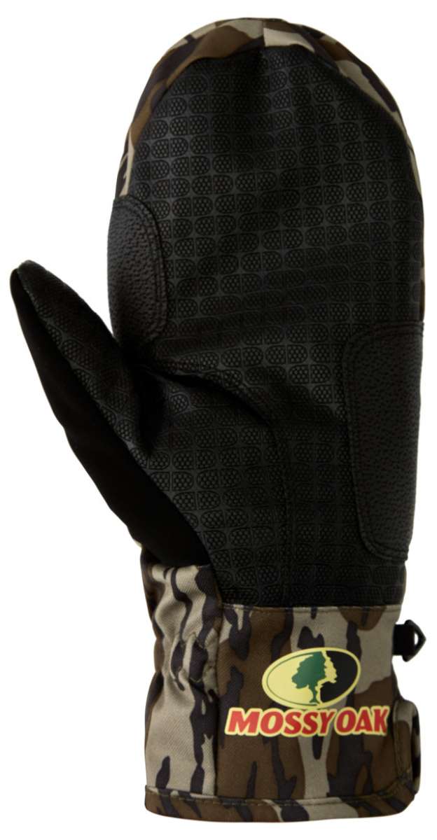 DC Tribute Mitt 2023 - A black mitt with a textured pattern on the palm, featuring a camouflage design at the wrist and thumb area.