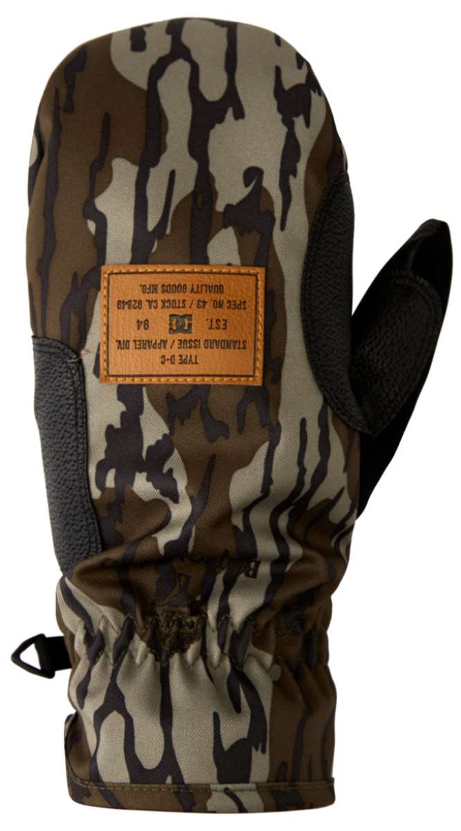 DC Tribute Mitt 2023 - A pair of mittens with a camouflage pattern in shades of brown and tan, featuring a rectangular leather patch on the back.