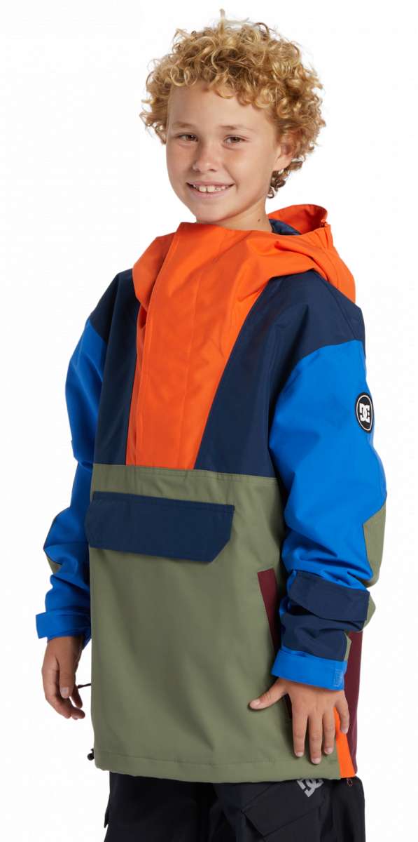 DC Youth 43 Insulated Anorak Jacket 2024 - A navy blue jacket with a red zipper and two zippered pockets on the front.