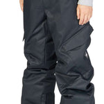 DC Youth Banshee Insulated Pant 2024 - Black snow pants with a white logo on the left leg, featuring a zippered pocket and adjustable velcro straps at the waist.