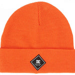 DC Youth Label Beanie 2024 - A bright orange beanie with a black label featuring white lettering on the front.