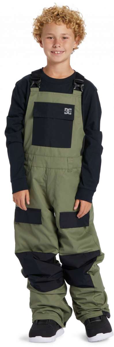 DC Youth Roadblock Insulated Bib 2024 - A pair of olive green snow pants with black accents and a white DC logo on the left leg.