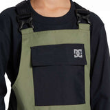 DC Youth Roadblock Insulated Bib 2024 - A pair of olive green insulated bib overalls with a black logo on the left leg and adjustable straps.