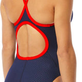 TYR Ladies' Hexa Diamondfit Swimsuit - A navy blue swimsuit with a diamond pattern and red trim around the edges.