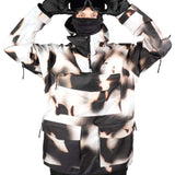 Endeavor 3 Layer Patrol Cargo Anorak - A black and white anorak with a large cargo pocket on the front, featuring a zippered chest pocket and adjustable cuffs.