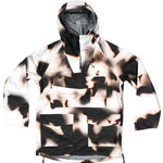 Endeavor 3 Layer Patrol Cargo Anorak - A black and white camouflage anorak with a hood, featuring cargo pockets on the front.