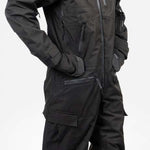 Endeavor 3L Shelter One Piece Suit 2024 - Black snowsuit with a high collar and zippered pockets on both sides.