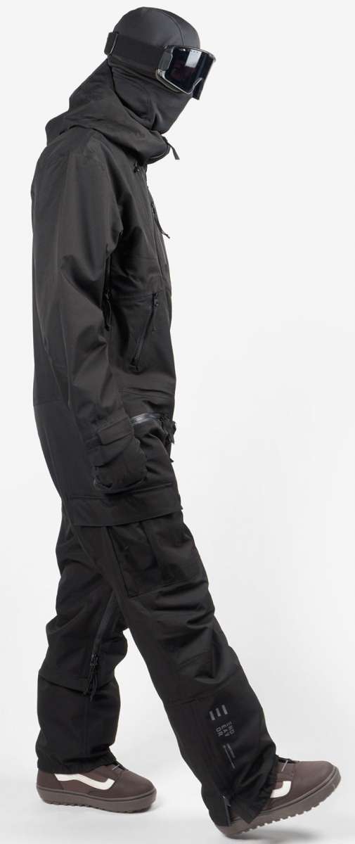Endeavor 3L Shelter One Piece Suit 2024 - Black snowsuit with a high collar and zippered pockets on both sides.