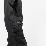 Endeavor 3L Shelter One Piece Suit 2024 - Black snowsuit with a high collar and zippered pockets on both sides.