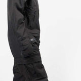 Endeavor 3L Shelter One Piece Suit 2024 - Black snowsuit with a high collar and zippered pockets on both sides.