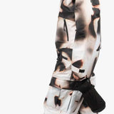 Endeavor 3L Shelter One Piece Suit 2024 - A black and white snowsuit with a geometric pattern of abstract shapes, featuring a hood and zippered pockets.