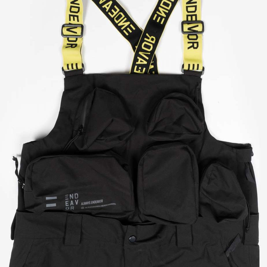 Endeavor 3L Shelter Removable Bib Pants 2024 - Black bib pants with zippered leg pockets and adjustable suspenders.