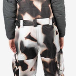 Endeavor 3L Shelter Removable Bib Pants 2024 - Black bib pants with white and brown abstract pattern on front, back, and legs.