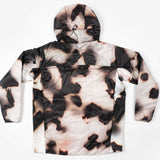 Endeavor Shelter Insulated Jacket 2024 - A black insulated jacket with a white snowflake pattern and a hood, laid flat on a solid background.