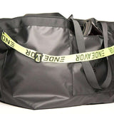 Endeavor Surplus Cargo Bag - A large, black duffel bag with a zippered top and two shoulder straps.