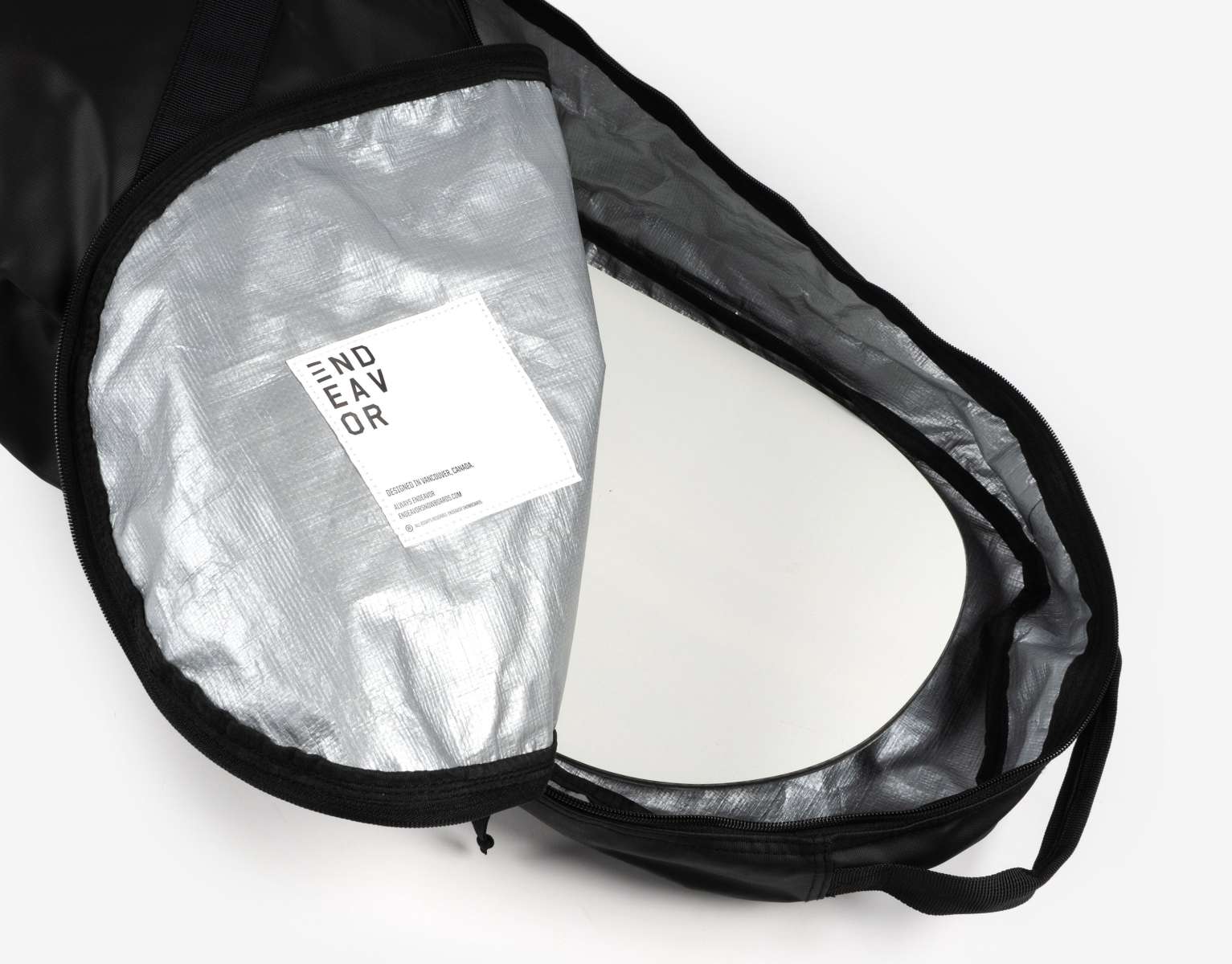 Endeavor Trail Snowboard Bag 2024 - Black snowboard bag with a zippered top and black straps on the side.