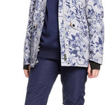 Roxy Women's Liberty Pullover Technical Hoodie 2020 - A woman with long blonde hair wearing a gray knit beanie, a blue and white floral patterned hoodie with a hood and zipper closure.