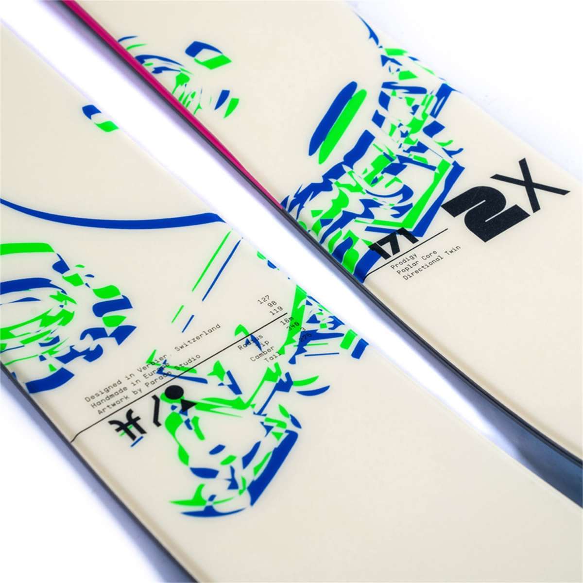 Faction Women's Prodigy 2X Skis 2024 - White skis with blue and green abstract design on top, black bindings at tip and tail.