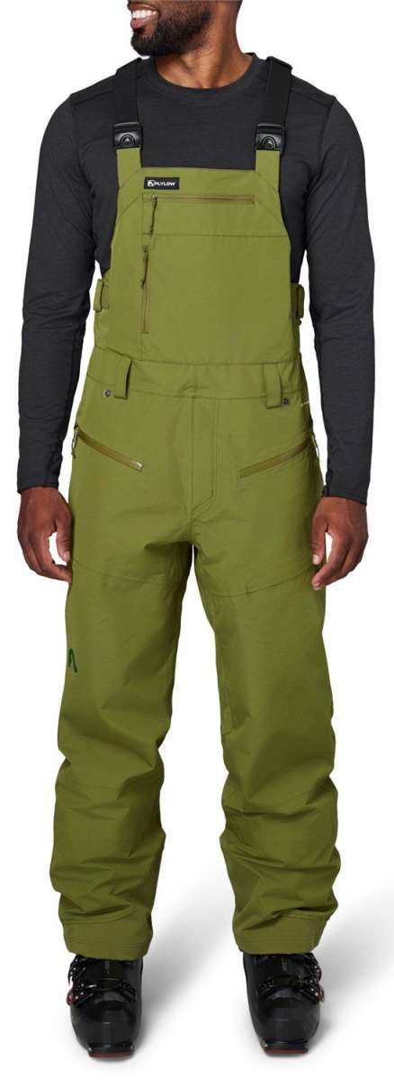 Flylow Firebird Shell Bib Pants 2024 - Olive green bib pants with zippered leg vents and adjustable side straps.