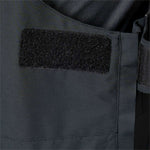 Flylow Firebird Shell Bib Pants 2024 - Dark gray bib pants with black elastic waistband and zippered fly, featuring a subtle snowflake pattern on the left leg.