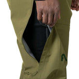 Flylow Firebird Shell Bib Pants 2024 - Olive green bib pants with a black zipper and flylow logo on the left leg.