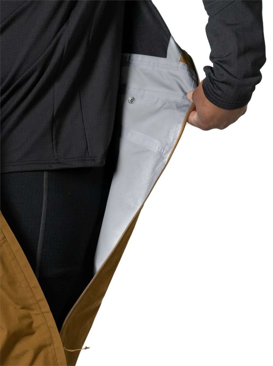 Flylow Firebird Shell Bib Pants 2024 - Black bib pants with a subtle white stripe on the side of the leg.
