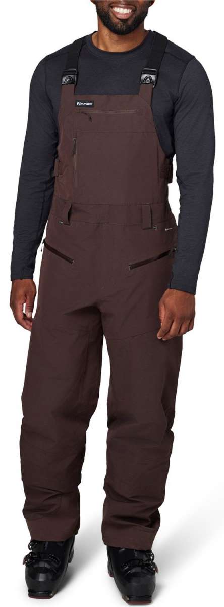 Flylow Firebird Shell Bib Pants 2024 - Black bib pants with black hardware and a subtle snowflake pattern on the left leg.