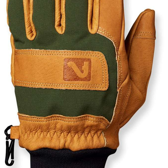 Flylow Magarac Glove 2024 - A tan glove with a green palm and thumb, featuring a brown leather patch on the wrist.