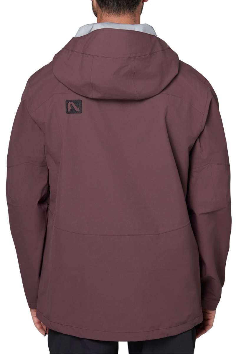 Flylow Quantum Pro Shell Jacket 2024 - A dark brown jacket with a black logo on the upper left side of the back.