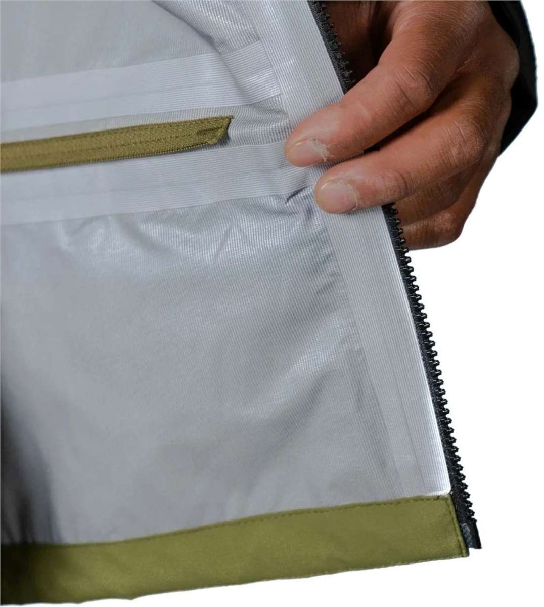 Flylow Quantum Pro Shell Jacket 2024 - A black jacket with a white logo on the left chest and a zippered pocket on the right side.