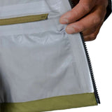 Flylow Quantum Pro Shell Jacket 2024 - A black jacket with a white logo on the left chest and a zippered pocket on the right side.